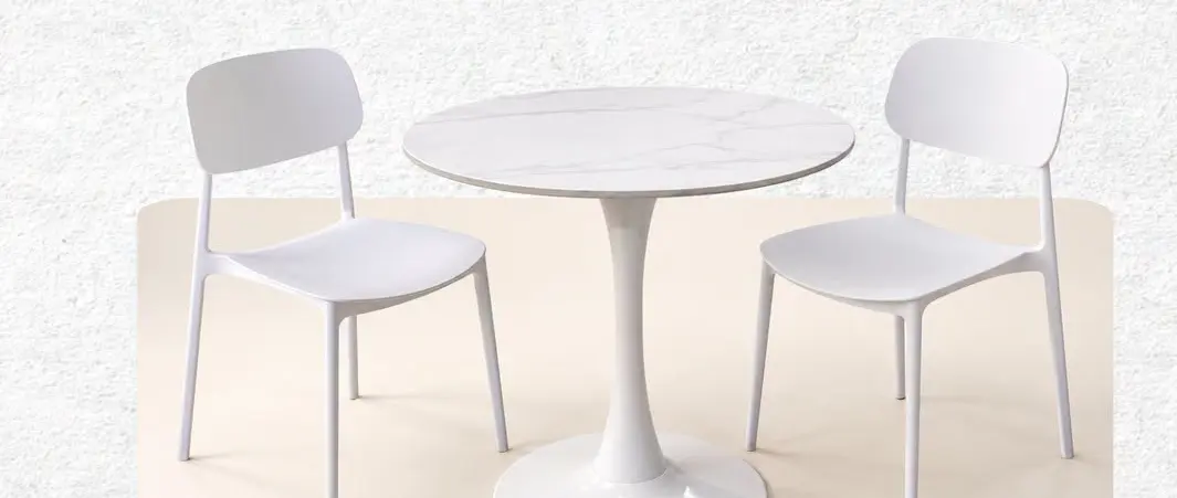 Aubrice cafe set: a round white table and two chairs